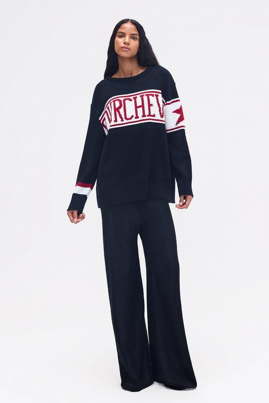 CALÇA TRICOT PRETA LISTRAS BRANCAS